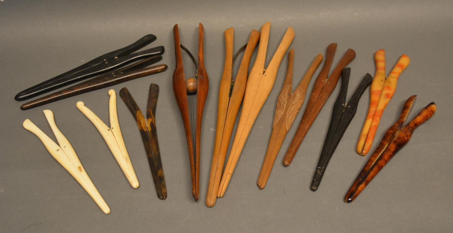 A Pair Of Treenware Glove Stretchers, together with a small collection of other glove stretchers