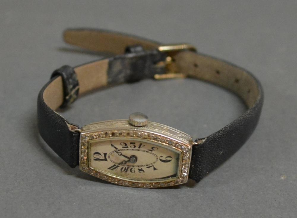 An Art Deco Platinum And Diamond Cocktail Watch With Leather Strap