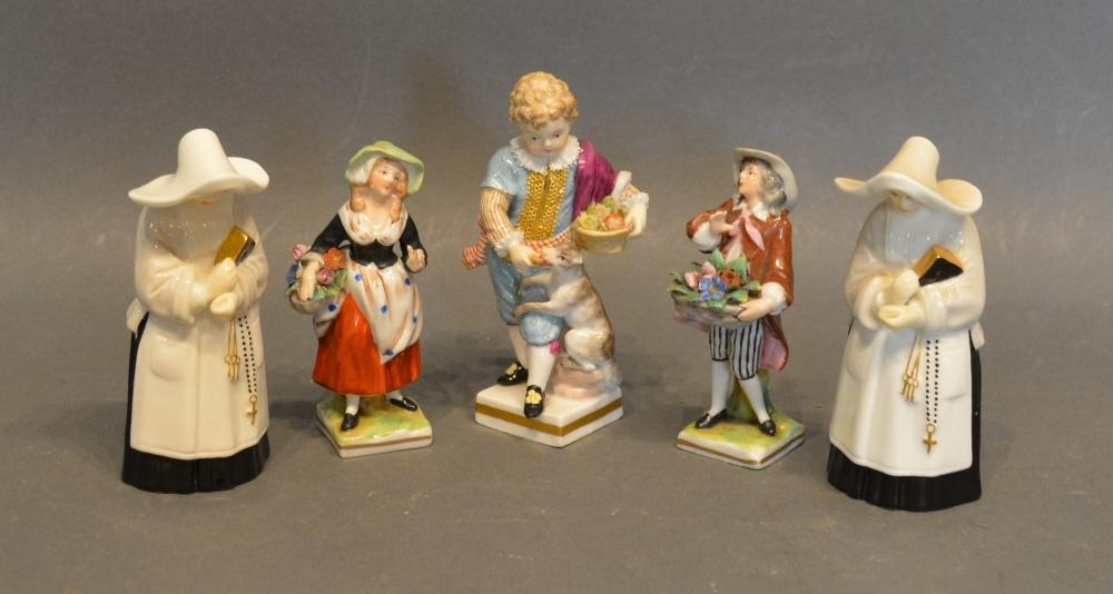 A Meissen Porcelain Figure Decorated In Polychrome Enamels, highlighted with gilt, 10cms tall, a