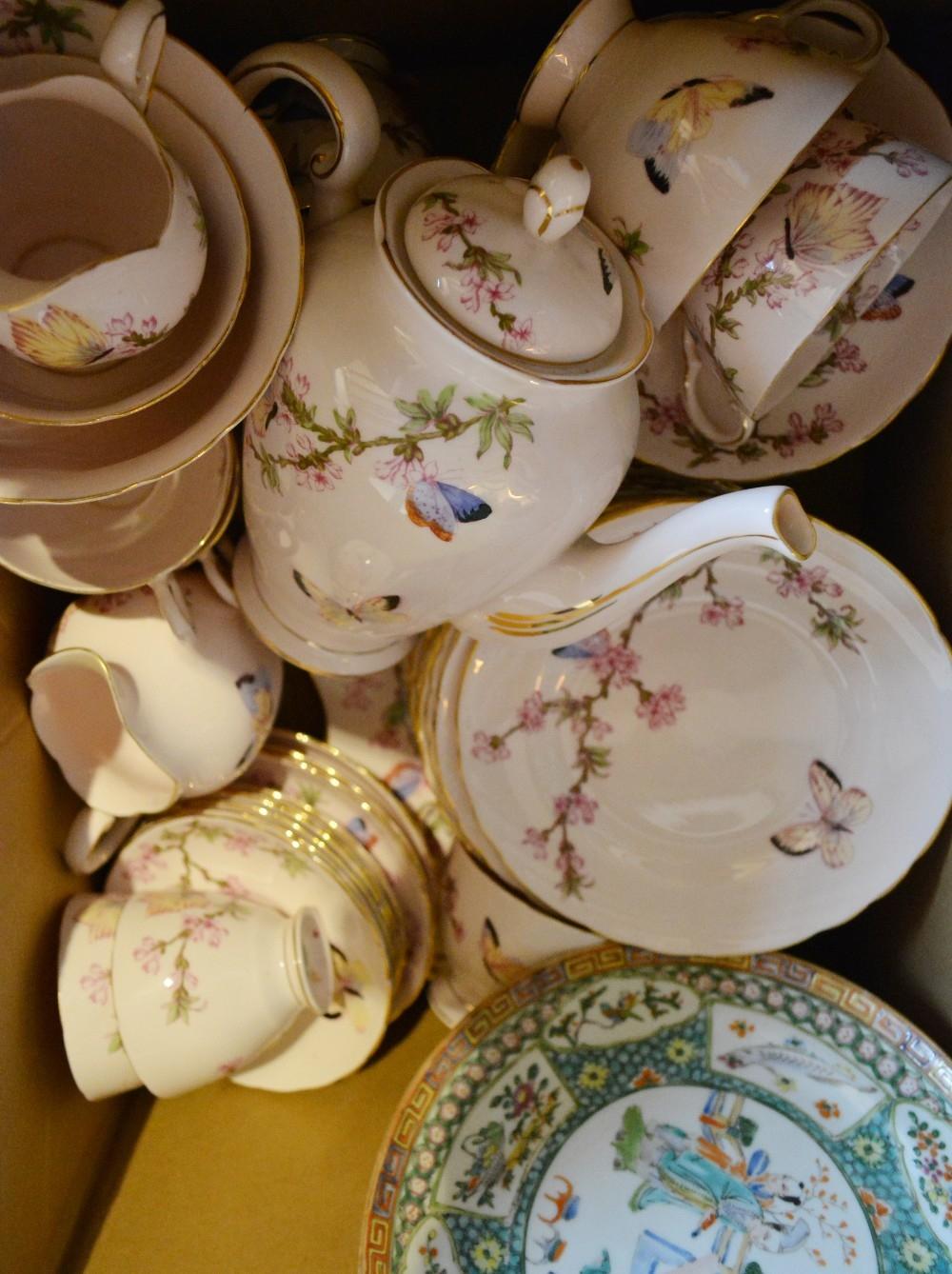 A Tuscan Porcelain Tea Service decorated with Butterflies amongst Foliage together with a collection