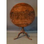 A George III Oak Pedestal Table With A Turned Centre Column and tripod supports, 72cm diameter