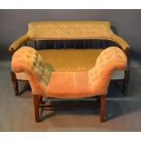 A Late Victorian Walnut Sofa With A Spindle Back above a stuff over seat, raised upon turned legs,