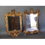 A 19th Century French Gilt Framed Wall Mirror with Bird Cresting together with another similar