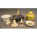 A Royal Worcester Candle Snuffer Modelled as an Owl in a Hood, together with another snuffer and a