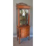 An Edwardian Mahogany And Marquetry Inlaid Display Cabinet, the shaped top above an astragal