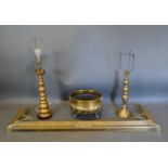 A Regency Brass Jardiniere together with two brass Table Lamps and a brass Fender