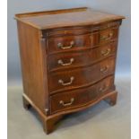 A 20th Century Mahogany Serpentine Chest, the moulded top above a brushing slide and four long