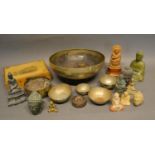 An Indian Brass Bowl, together with similar smaller bowls, a small collection of Chinese figures and