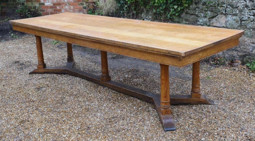 A Blonde Oak Large Refectory Style Dining Table, the plank top above a plain frieze, raised upon - Image 2 of 5