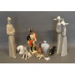 A Naples Porcelain Model Of A Hussar, together with a Lladro group of two nuns and various other