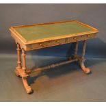 A Victorian Walnut Side Table The Tooled Leather Top With Low Gallery, above two frieze drawers with