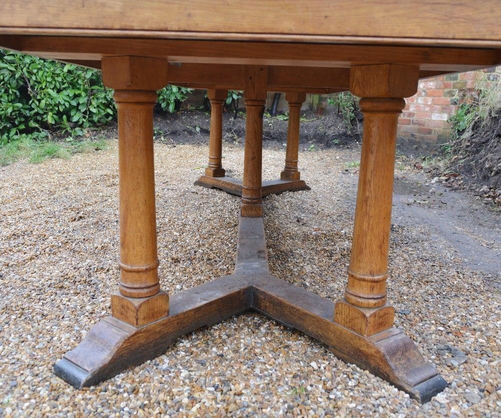 A Blonde Oak Large Refectory Style Dining Table, the plank top above a plain frieze, raised upon - Image 5 of 5