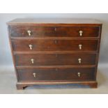 A 19th Century Oak Chest of Four Long Drawers with Brass Drop Handles, raised upon bracket feet, 100