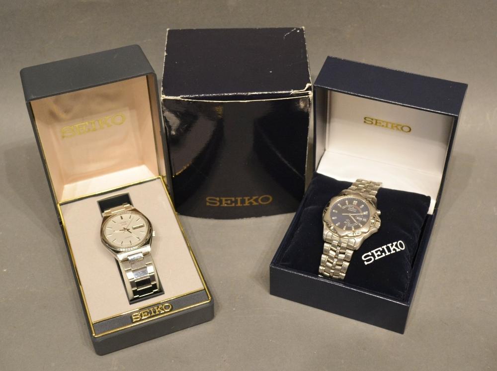 A Seiko Kinetic SQ50 Stainless Steel Cased Gentleman's Wrist Watch together with another similar