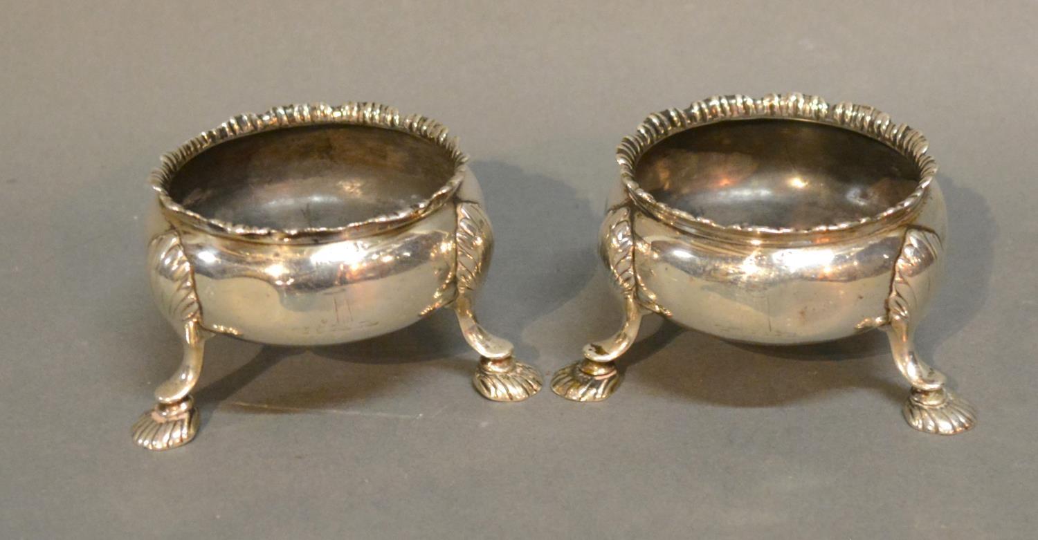 A Pair Of George III Silver Salts Of Circular Form Each With Hoof Supports