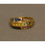 A 9ct Gold Cocktail Ring set Blue, Pink and Yellow Stones