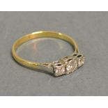 An 18ct. Yellow Gold Three Stone Diamond Ring Pave Set