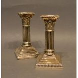 A Pair Of Silver Plated Dwarf Candlesticks Of Corinthian Form, 14cm tall