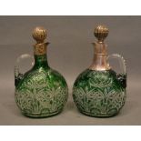 A Pair Of Edwardian Silver Mounted Cut Green Glass Decanters With Stoppers, one dated to 1904, the