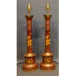 A Pair Of Toleware Chinoiserie Decorated Table Lamps, with red grounds, 50cm tall