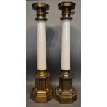 A Pair Of Opaque Glass And Gilt Metal Mounted Table Lamps of cylindrical tapering form, 64cm tall