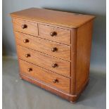 A Victorian Mahogany Straight Front Chest Of Two Short And Three Long Drawers with knob handles,