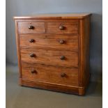 A Victorian Mahogany Straight Front Chest Of Two Short and three long drawers with knob handles,