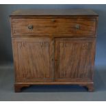 A Regency Mahogany Secretaire Side Cabinet The Reeded Top above a fully fitted secretaire drawer and