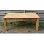 A Pine Farmhouse Dining Table, the plank top above four square legs 179cm by 86cm