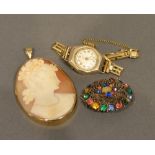 A 9ct. Gold Framed Pendant Cameo, Together With A Paste Brooch and an Alma ladies wrist watch