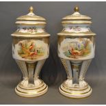 A Pair Of Dresden Porcelain Covered Urns Each With Hand Painted Reserves depicting birds within