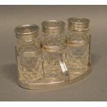 A George III Silver Ink Stand The Three Cut Glass Bottles with Victorian silver mounts