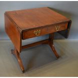 A 19th Century Mahogany Line Inlaid Sofa Table With A Frieze Drawer opposed by a dummy drawer,