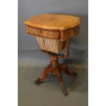 A Victorian Burr Walnut Work Table The Shaped Moulded Top above a frieze drawer with pull out fabric