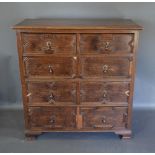 An Early 20th Century Oak Chest The Moulded Top Above Two Short and three long moulded drawers