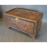 A Chinese Hardwood Chest The Hinged Top Inlaid With Soap Stone above a similar front, raised upon