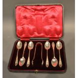 A Set Of Six Sheffield Silver Teaspoons With Matching Tongs In Fitted Case