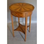 A 19th Century French Two Tier Occasional Table, The Sectional Inlaid Top above an inlaid frieze,