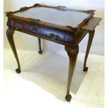 A Burr Walnut Silver Table The Shaped Galleried Top Above Frieze Drawer with brass handles, raised