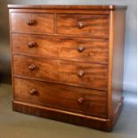 A Victorian Mahogany Straight Front Chest Of Two Short And Three Long Drawers with knob handles,