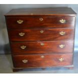 A 19th Century Mahogany Straight Front Chest Of Four Long Drawers with brass handles and