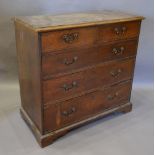 A George III Oak Chest, The Moulded Top Above Two Short and three long drawers with brass handles,