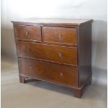 A 19th Century Mahogany Straight Front Chest Of Two Short And Two Long Drawers with circular brass