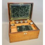 A 19th Century Mahogany And Mother Of Pearl Inlaid Dressing Case, the hinged cover enclosing a