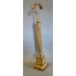 A Brass Empire Style Table Lamp of Corinthian Form with Square Stepped Base, 84 cms tall