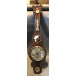 A 19th Century Mahogany Wheel Barometer/Thermometer by M & E Levin, London
