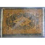 A North West Persian Woollen Rug with a central medallion within an allover design upon a blue and