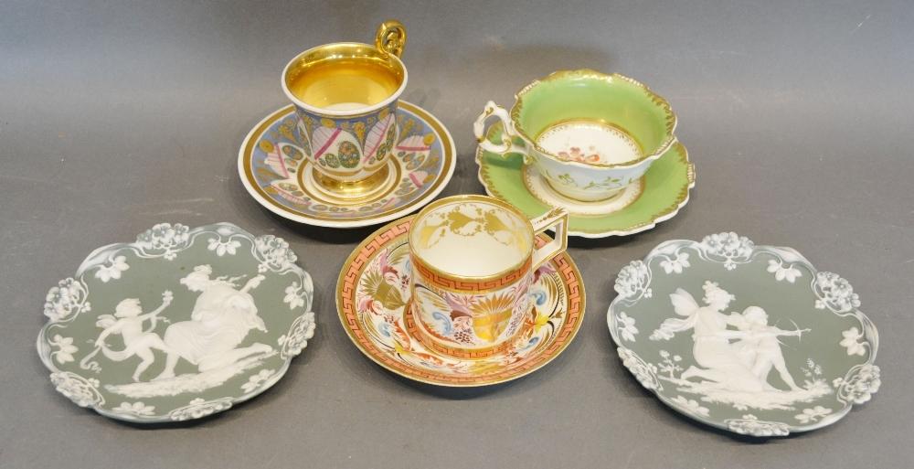 An Early 19th Century Derby Cup and Saucer, together with a Continental chocolate cup and saucer,