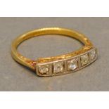 An 18 Carat Yellow Gold and Platinum Set Five Stone Diamond Ring