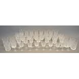 A Waterford Cut Glass Drinking Set, comprising wine glasses, champagne glasses and tumblers